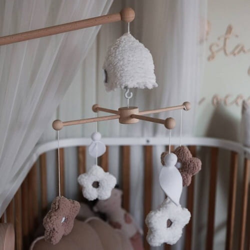 Stokrotki – karuzela do łóżeczka z obrotową pozytywką Muzpony 2