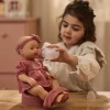 Lalka bobas Livia z butelką i nocnikiem pije i siusia jak niemowlę Little Dutch 2