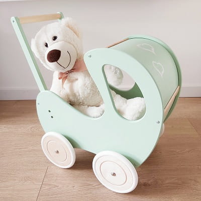 Drewniany wózek dla lalek RETRO pchacz miętowy z drewnem 1